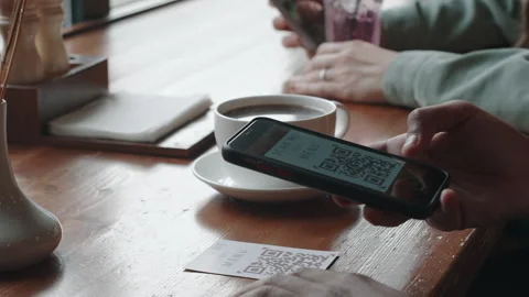 Unrecognizable Man Using Camera on Phone, Scanning QR-code, Accessing Cafe Menu Stock Footage 293577328
