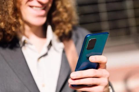 Unrecognizable man using mobile phone Stock Photos