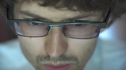 Unrecognizable man using a modern portable computer on an outdoor table, street Stock Footage 65377244