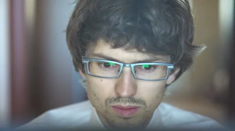 Unrecognizable man using a modern portable computer on an outdoor table, street Video stock 65377902