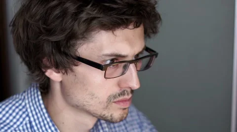 Unrecognizable man using a modern portable computer on an outdoor table, street Stock Footage 65379115
