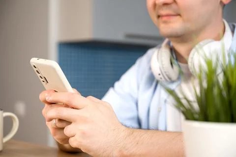 Unrecognizable man using smatphone for online communication,shopping etc Stock Photos