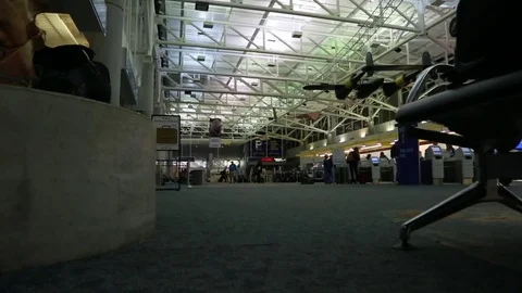 Unrecognizable man walking at airport Stock Footage 78077161