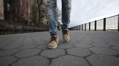 Unrecognizable man walking through the city Stock-Footage 61387164