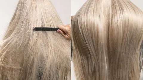 Unrecognizable model with long blond straight hair, slow motion before and after Stock Footage 308632706