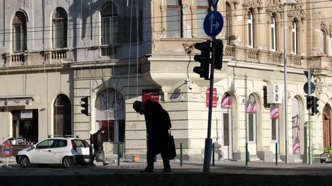 Unrecognizable old man walking on the street Stock Footage 169882192