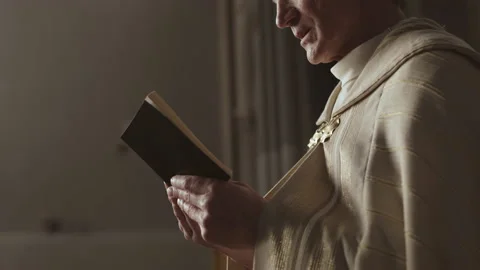 Unrecognizable Old Pastor Reading Holy Bible Stock Footage 152765197