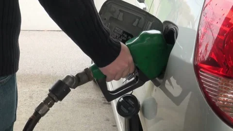 Unrecognizable opening to refuel the gas tank of car Refueling car at the refuel Stock Footage 336561298