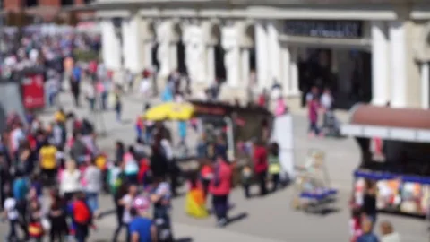 Unrecognizable, out of focus people walking in city downtown Stock Footage 74383810