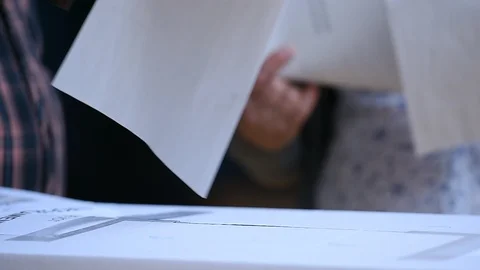 Unrecognizable people casting their votes inside voting booths during elections 스톡 동영상 119657104