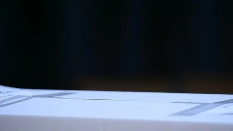 Unrecognizable people casting their votes inside voting booths during elections Video stock 119657115