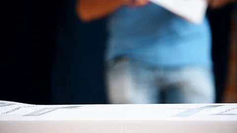 Unrecognizable people casting their votes inside voting booths during elections 스톡 동영상 119657168