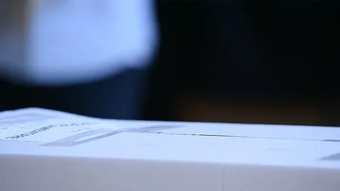 Unrecognizable people casting their votes inside voting booths during elections 스톡 동영상 119657172