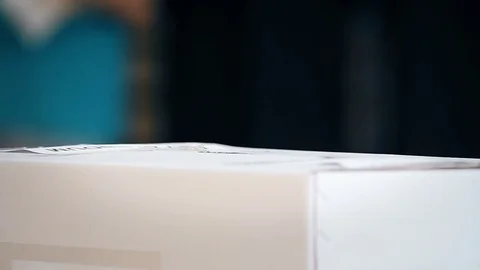 Unrecognizable people casting their votes inside voting booths during elections Video stock 119657227