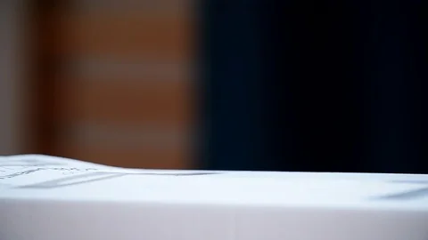 Unrecognizable people casting their votes inside voting booths during elections Video stock 119657231