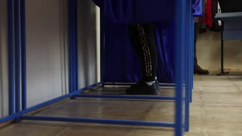 Unrecognizable people casting their votes during election day 스톡 동영상 294087627