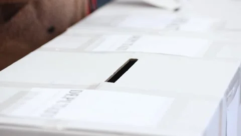 Unrecognizable people casting their votes during election day 스톡 동영상 294087648