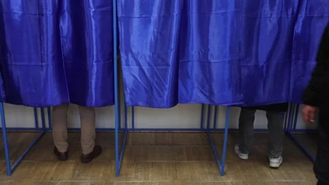 Unrecognizable people casting their votes during election day 스톡 동영상 294087651