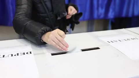 Unrecognizable people casting their votes during election day 스톡 동영상 294087657
