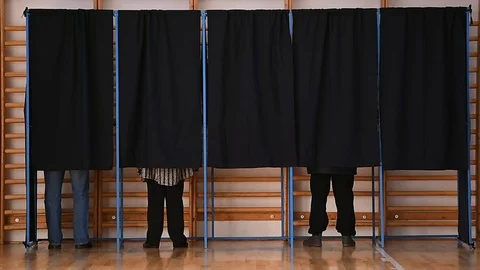 Unrecognizable people casting votes into the ballot box during elections 스톡 동영상 70520810