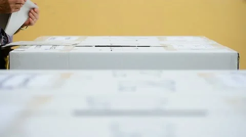 Unrecognizable people casting votes Video stock 63881652