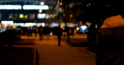 Unrecognizable people on the sidewalk. Evening n Warsaw. Video stock 86568779