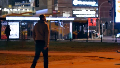 Unrecognizable people on the sidewalk. Evening n Warsaw. Stock-Footage 104612840