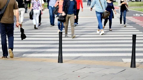 Unrecognizable people on the sidewalk in Warsaw. Stock Footage 85706575