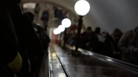Unrecognizable people in the subway go down and go up the escalator. Stock Footage 151109028