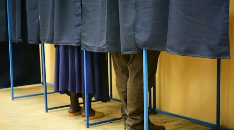 Unrecognizable people voting inside booths 動画素材 63905837