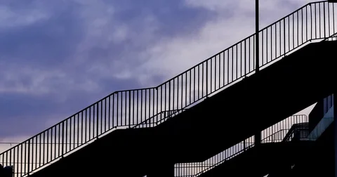 Unrecognizable people walking on the stairs. Video stock 84133354