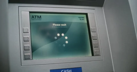 Unrecognizable Person Entering PIN Code. Error Message on Cash Machine Due to Stock Footage 310114823