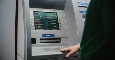 Unrecognizable Person Entering PIN Code. Error Message on Cash Machine Display Stock Footage 310130719