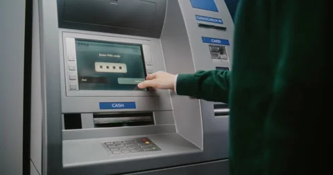 Unrecognizable Person Entering PIN Code. Error Message on Cash Machine Display 動画素材 310136482