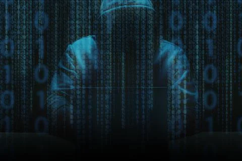 Unrecognizable person using a laptop computer with a hoodie 스톡 사진