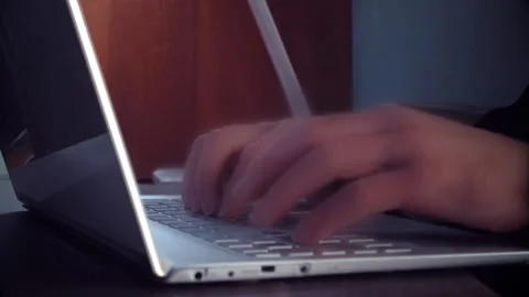 Unrecognizable person working at laptop with rush, typing computer keyboard fast Stock-Footage 196016135