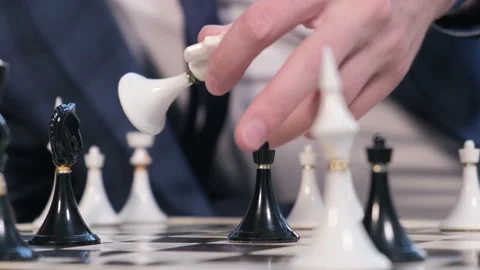 Unrecognizable player making a move playing chess, close-up Stock Footage 163601301