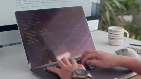 Unrecognizable Programmer Launching Code on Laptop and Computer Stock Footage 265071153