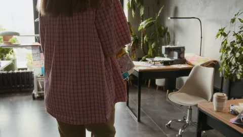 Unrecognizable Seamstress Carrying Patchwork Quilt Detail to Machine for Sewing Stock Footage 315759044