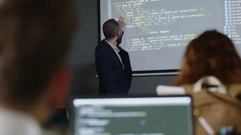 Unrecognizable Student Answering Question at Programming Lesson Stock Footage 278125771