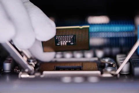 Unrecognizable Technician Installing New CPU Into Computer Stock Photos