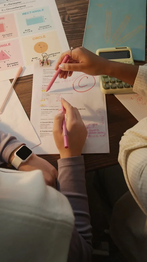 Unrecognizable Tutor and Student Solving Math Problem Together Stock Footage 329669921