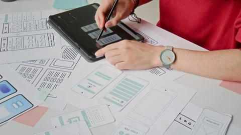 Unrecognizable UI Designer Choosing and Ticking Wireframes on Tablet Stock Footage 327901200