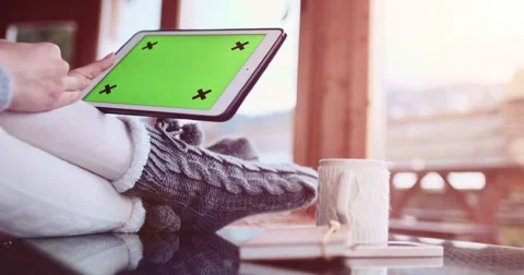 Unrecognizable woman using tablet with green screen. Slow Motion 4K, DCi. Video stock 68823175