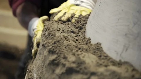 Unrecognizable Worker Preparing Fake Bell Mold in Casting Workshop. Stock Footage 220948740