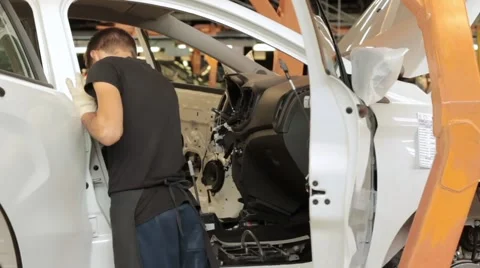 Unrecognizable worker working with car salon equipment 스톡 동영상 66507772