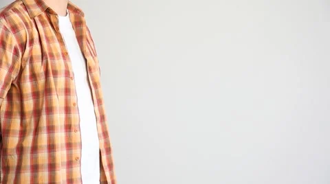 Unrecognizable young man examining sheet of paper and throwing away their Stock Footage 60407677