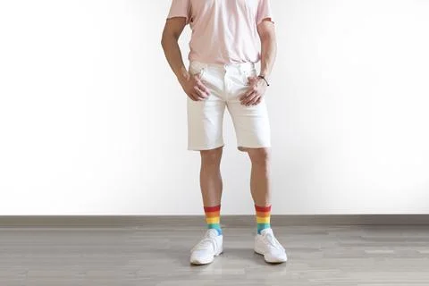 Unrecognizable young man posing dressed in rainbow socks. Concept of freedom, Stock Photos