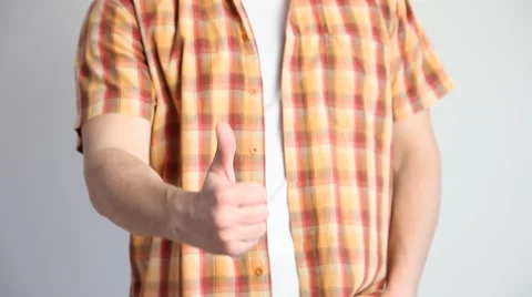 Unrecognizable young man showing a thumb up sign Stock Footage 60408416