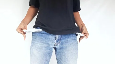 Unrecognizable young men showing her empty pockets without money. Stock Footage 288974736